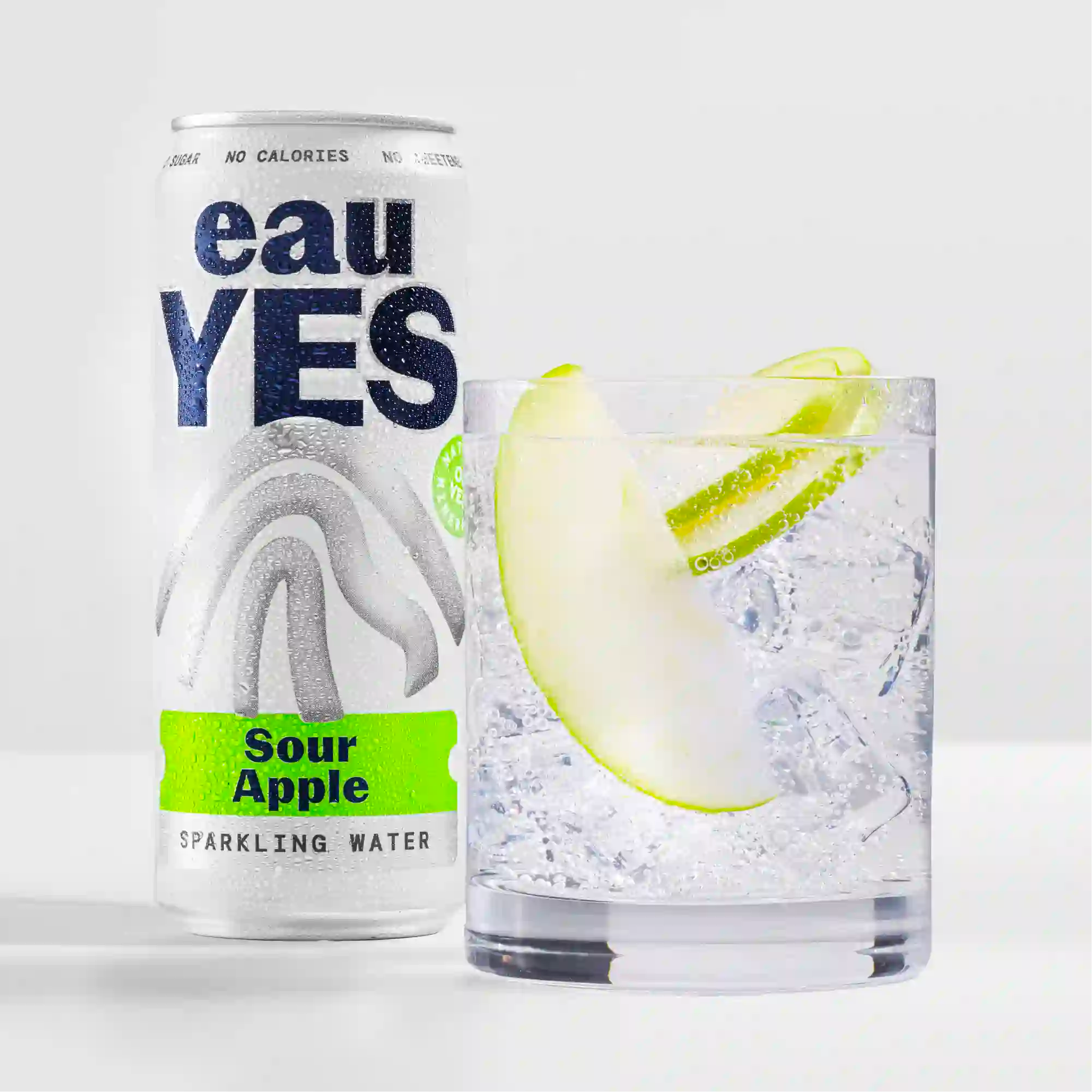 eauyes sour apple sparkling water can and glass